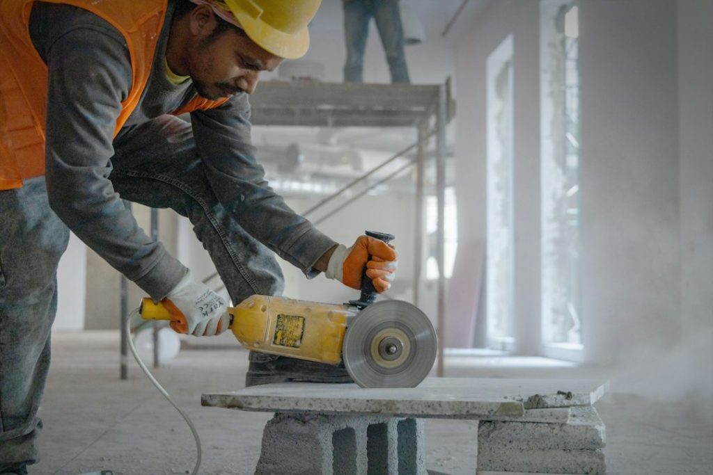 Construction worker choosing tools for a job