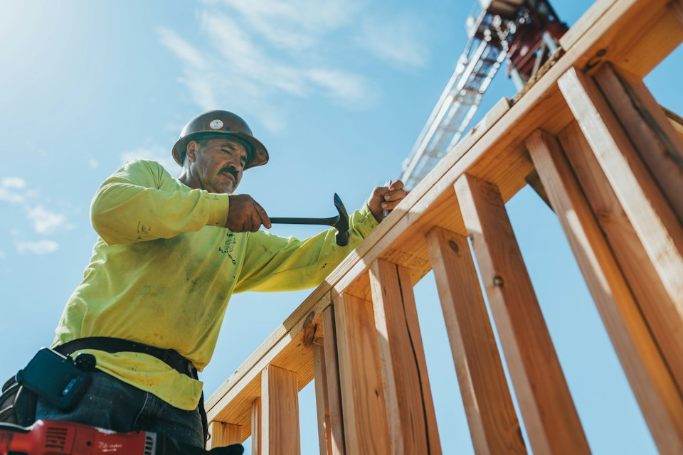 Construction worker in safety equipment on site, illustrative of drilling safety