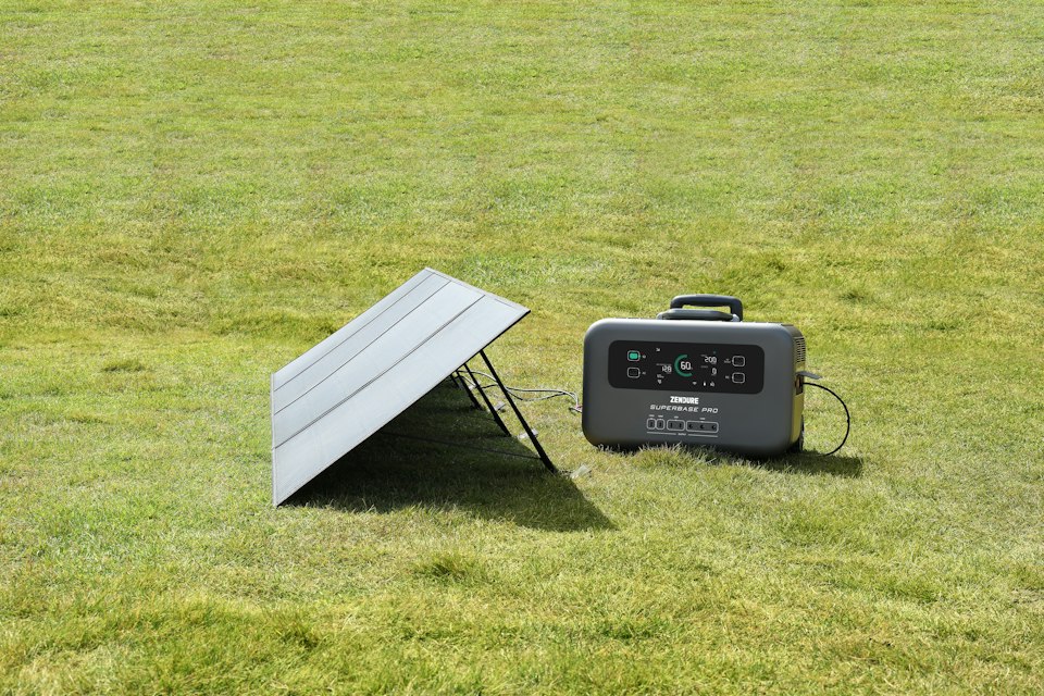 Portable generator outdoors illustrating need for safe positioning away from buildings