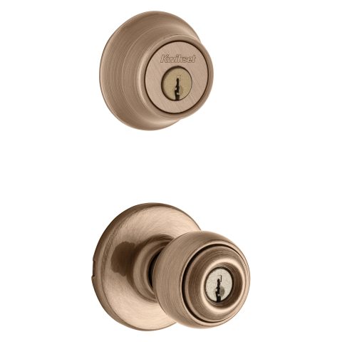 Kwikset Polo knob and deadbolt security set in antique brass