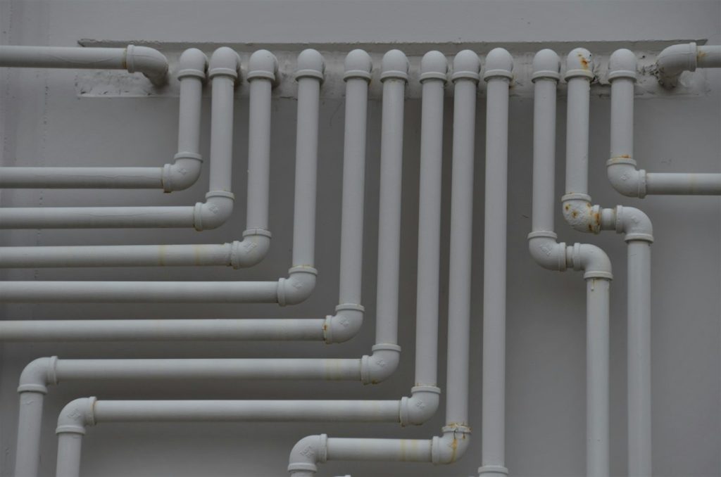 Illustrative photograph: PVC plumbing pipe leaks home