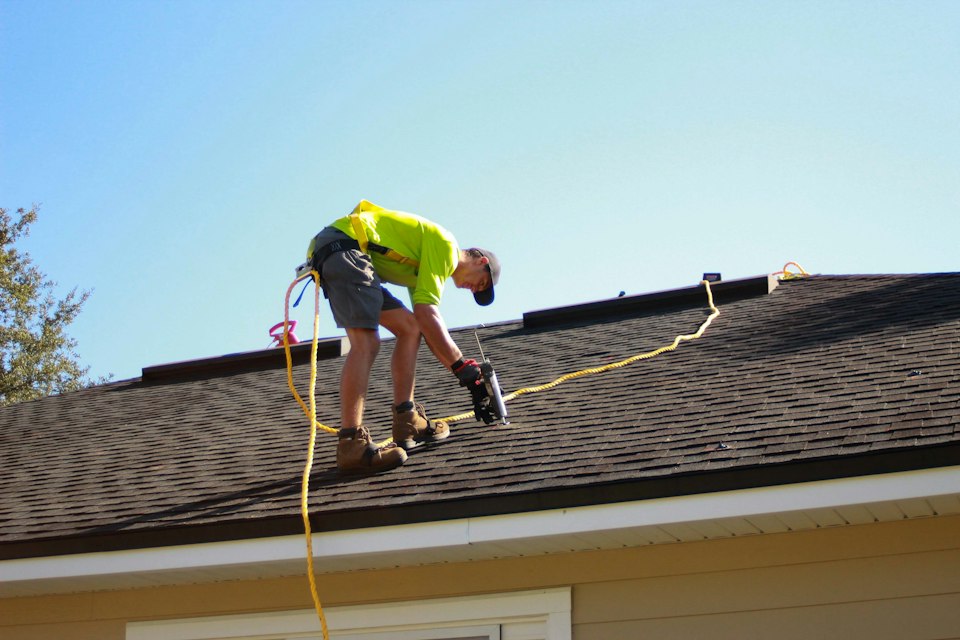 Roof maintenance work showing the importance of professional inspection